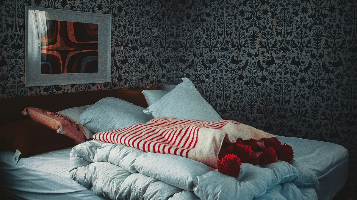 ベッドで眠る人のイメージ